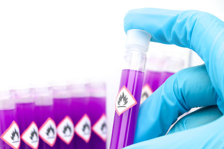 flammable chemicals in test tubes and flammable symbol