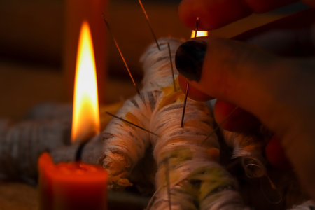 Candle light in the dark and curse doll, candle light ceremony