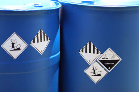 Corrosive chemical symbols on a chemical tank, dangerous products in the industryの写真素材