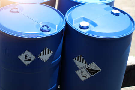 Corrosive chemical symbols on a chemical tank, dangerous products in the industryの写真素材