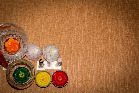 candles and glass on wood background, Rituals and beliefs or religionsの写真素材