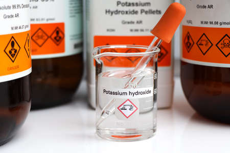 potassium hydroxide in glass, chemical in the laboratory and industryの写真素材