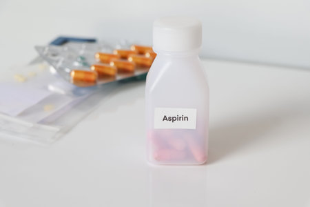 Aspirin in bottle ,medicines are used to treat sick people.
