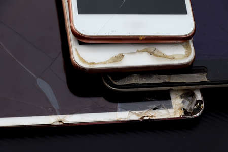 Mobile screen broke because it was dropped, broken glass screen smartphoneの写真素材