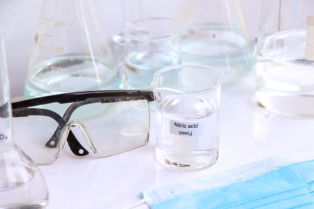 nitric acid in glass, chemical in the laboratory and industry, corrosive chemical