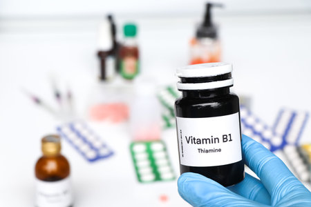 Vitamin B1 pills in a bottle, food supplement for health or used to treat disease