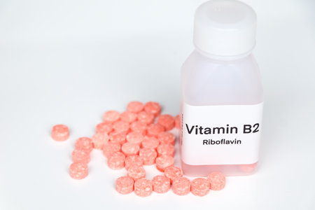 Vitamin B2 pills in a bottle, food supplement for health or used to treat diseaseの写真素材