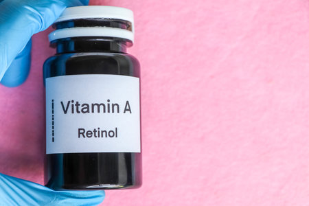 Vitamin A pills in a bottle, food supplement for health or used to treat disease