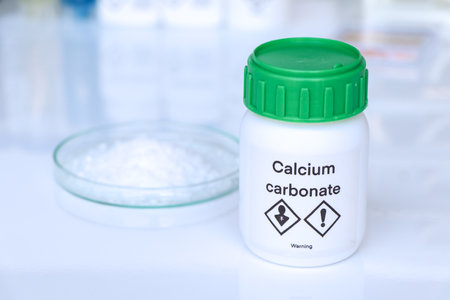 Calcium carbonate in bottle, chemical in the laboratory and industry, Chemicals used in the analysisの写真素材