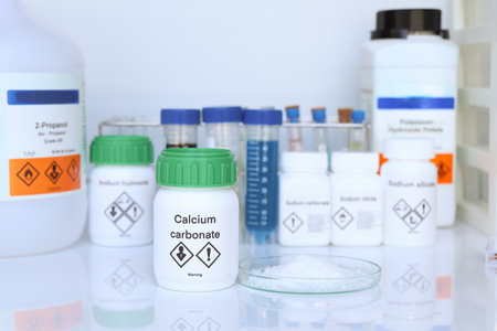 Calcium carbonate in bottle, chemical in the laboratory and industry, Chemicals used in the analysisの写真素材