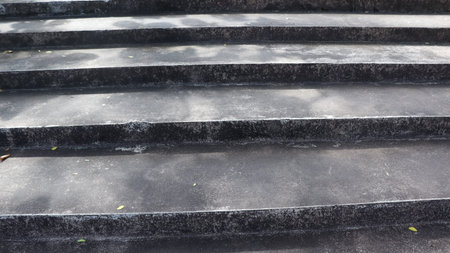 The pattern of the way up and down the stairs, empty stairs