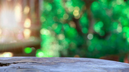 Empty wooden table with lights bokeh on blur nature background, table wood for product display templateの写真素材