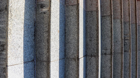 The pattern of the way up and down the stairs, empty stairs