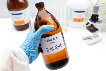 Nitric acid in bottle , chemical in the laboratory and industry, Chemical used in the analysisの写真素材
