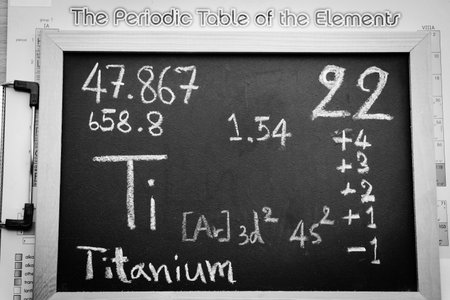 Titanium and symbol structural formula chemical on the blackboard, Chemistry in the classroomの写真素材