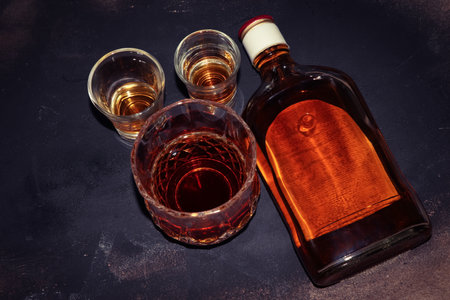 red strong alcohol drinks, hard liquors, spirits and distillates iset in glassesの写真素材