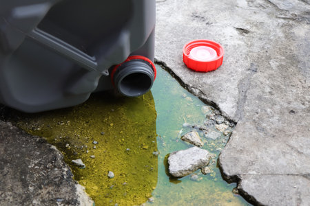 Chemicals from industry or laboratory  leak on the floor and damage the environmentの写真素材