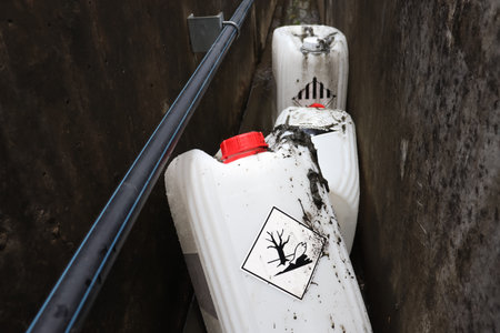 Chemicals from industry or laboratory  leak on the floor and damage the environmentの写真素材