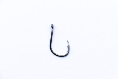 close up shot of fish hook on white background, and sharpの写真素材