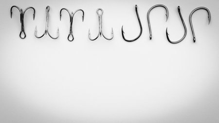 close up shot of fish hook on white background, and sharpの写真素材