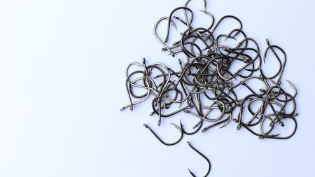 close up shot of fish hook on white background, and sharpの写真素材