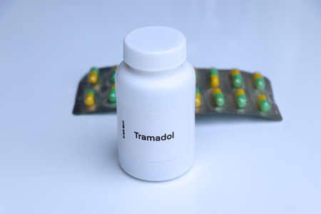 Tramadol pill in white bottle, pill stock, medical or pharmacy conceptの写真素材