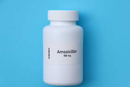 Amoxicillin pill in white bottle, pill stock, medical or pharmacy conceptの写真素材