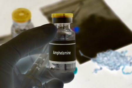 Amphetamine in a vial, narcotics are dangerous to health or brain nervous systemの写真素材
