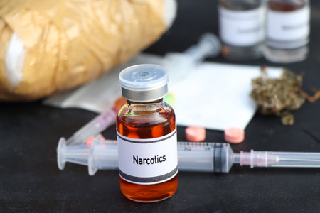 narcotics in a vial,  narcotics are dangerous to health or brain nervous systemの写真素材