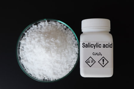 Salicylic acid in container, chemical analysis in laboratory, chemical raw materials in industryの写真素材