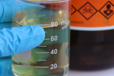 Yellow chemical experiment in the laboratory, Chemicals used in industry, clean energyの写真素材