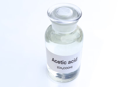 Acetic acid in containers, Hazardous chemicals and raw material, chemical in industry or laboratoryの写真素材