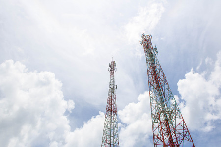 Communications tower with blue Cloud sky backgroundの写真素材