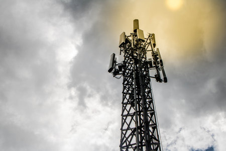 Communications tower with blue Cloud sky background