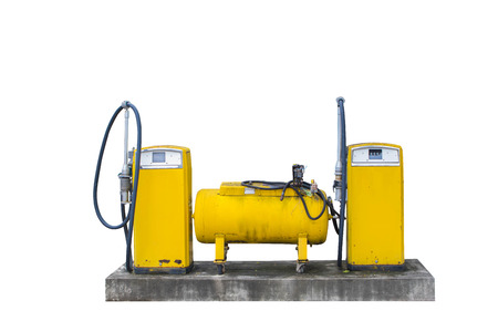 Abandoned gas pump isolated on white backgroundの写真素材