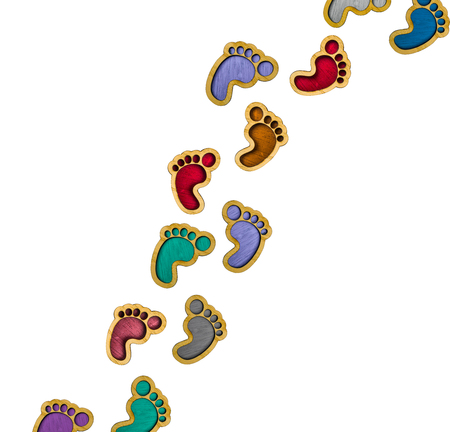 Wooden toy footprints isolate white background -background with copy space for textの写真素材