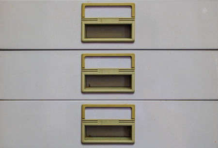 old filing cabinet with drawers abstract backgroundの写真素材