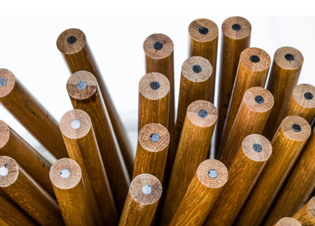 close-up brown pencils on white background