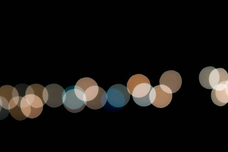 bokeh on black background texture. Abstract
