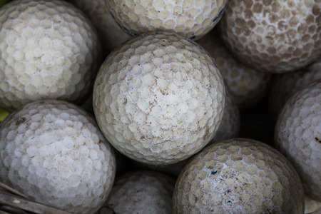 Close-up Many Old White golf ball texture. Abstract backgroundの写真素材