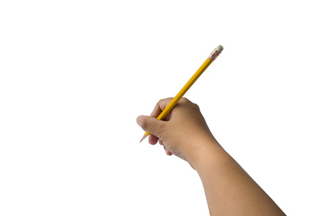 Close up hand of a female holding a Yellow Pencil isolated on white background with copy spaceの写真素材