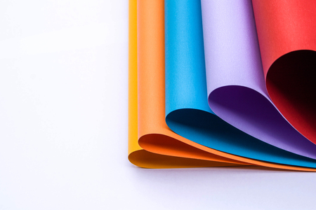colour paper on white background with copy spaceの写真素材