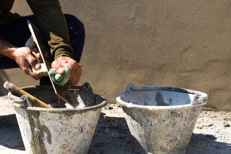 Technicians are working to build a brick wallの写真素材