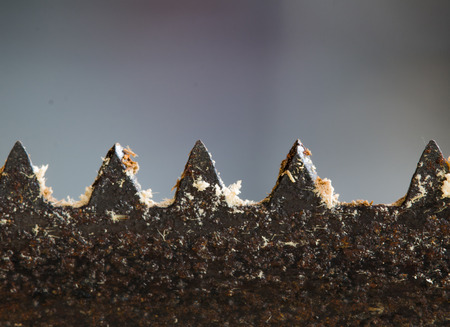 Close-up saw blade for process of cutting On table steel with copy spaceの写真素材
