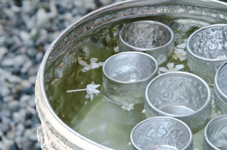 thai silver bowl with jusmin  in Song kran festival , Thailandの写真素材