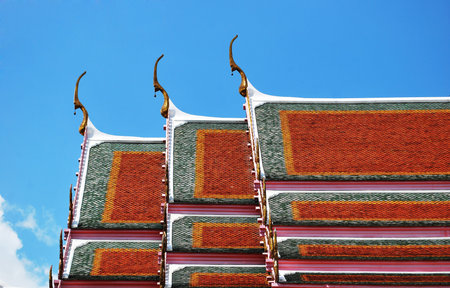 The Beautiful roof of temple on blue sky background 