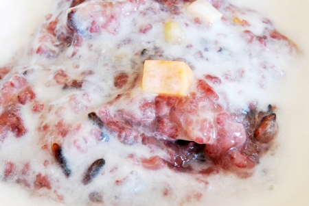 Thai dessert,black sticky rice pudding with coconut milkの写真素材