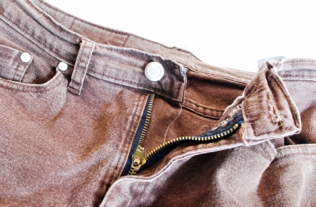 torn old brown jeans background,dirty pants の写真素材