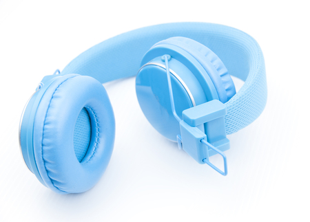 Blue headphones on white backgroundの写真素材