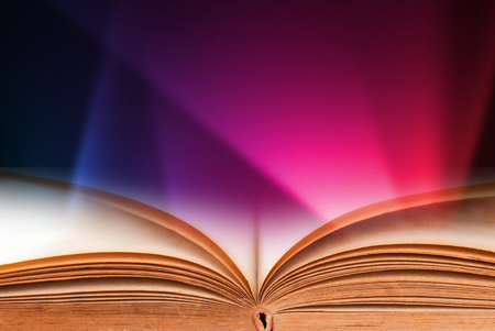 Abstract magic book on wooden backgroundの写真素材